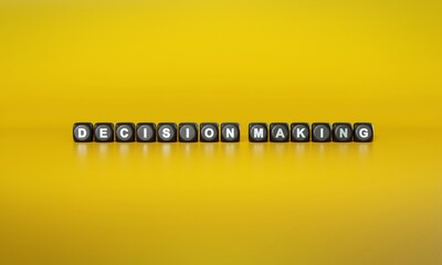 Words ‘Decision making’ spelled out in white text on dark wooden blocks against plain yellow background. 3D rendering