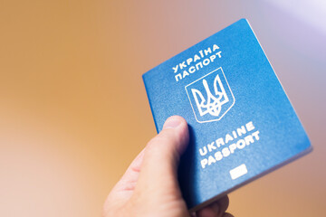 Ukrainian passport on hands