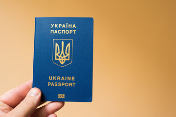 Ukrainian passport on hands