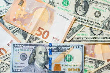 Fototapeta na wymiar dollars and euros on a background