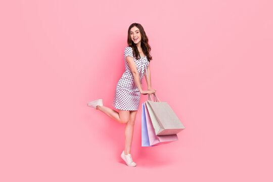 Full Size Image Of Stunning Young Lady In Vintage Style Dress Go Shopping In Mall Center Isolated On Pink Color Background