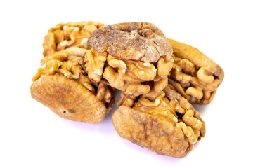 Stuffed dried figs. Dried figs stuffed with walnuts isolated on white background. Close-up. local name cevizli incir