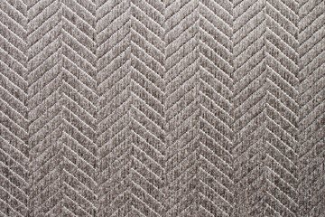 Fototapeta premium Fabric background. Sticky textured gray fabric with pattern close up. Fabric for the manufacture of fabric blinds or mat, wallpaper