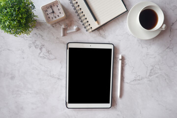 Mockup picture of business woman’s hands using tablet with white blank screen in modern place