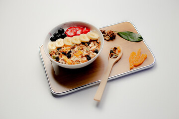 Homemade granola with yogurt and fresh berries.On a white background. nice presentation