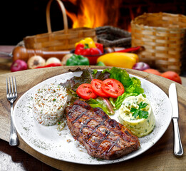 Grilled Steak with Salad and Mashed Potatoes