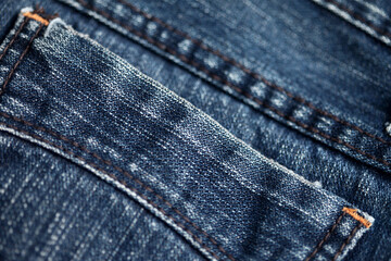 Jeans denim texture close up , focus only one point , soft blured background wallpaper