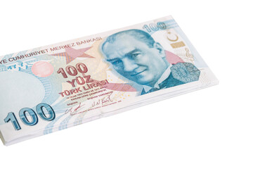 Obraz na płótnie Canvas hundred turkish lira banknotes isolated on white background. currency of turkey
