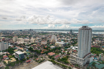 Cebu City, Philippines - May 2022: Northern Cebu City and Mandaue skyline. Mactan Island visible...