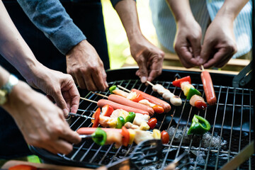 People hand grill BBQ in food party home garden