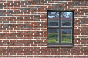 A fragment of a brick wall of a building in close-up