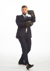 businessman in a business suit and boxing gloves posing on a white background isolated in full growth with a variety of emotions