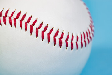 Close up macro of baseball stitch seam fibers and threads with a shallow depth of field and copy space
