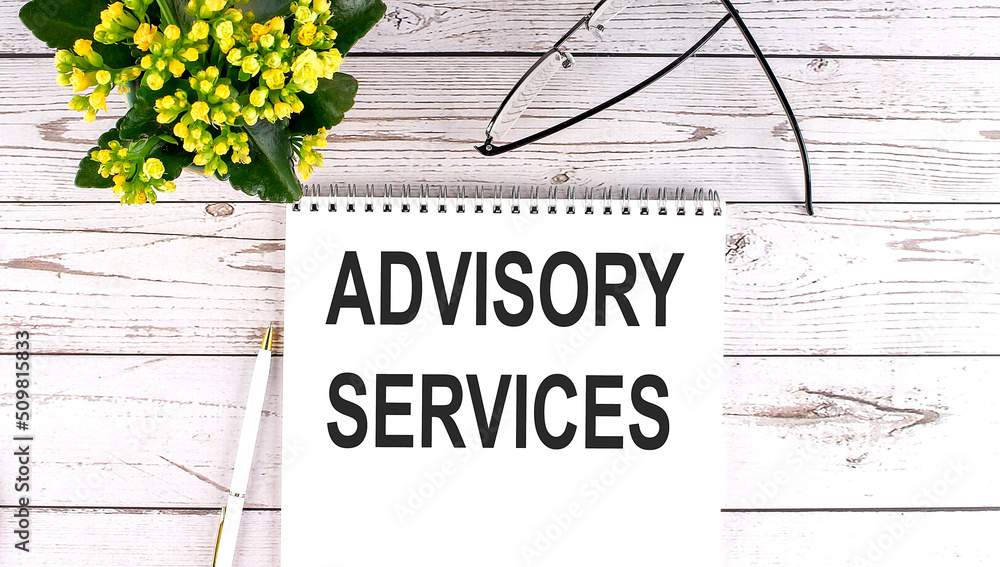 Poster advisory services text concept write on notebook on wooden background