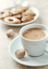  Cup of Coffee on bright stone background. Close up.