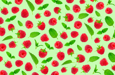 Flying raspberries with green mint leaves, lemon balm, melissa isolated on green background. Sweet ripe fresh delicious summer berry, organic food, vitamins. Creative background with falling raspberry