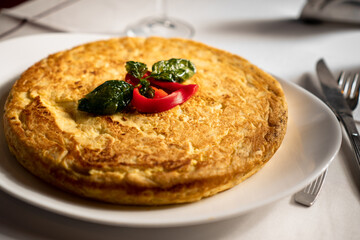 close up of a potato tortilla on a plate