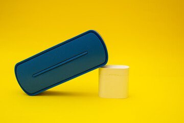 Blue boombox on yellow background, colors of the Ukrainian flag