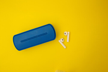 Blue boombox on yellow background, colors of the Ukrainian flag