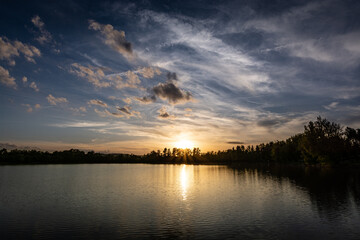 Fototapeta na wymiar Beautiful sunset on a lake, France