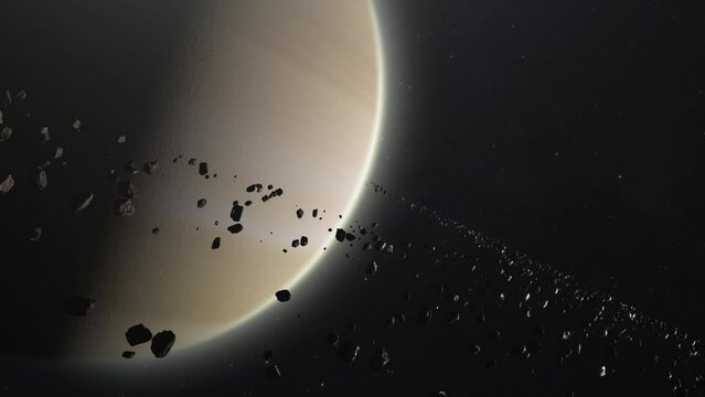 Cinematic Shot of Saturn and asteroids or rocks ring orbiting.
Huge planet on dark and starry space. Concept of Universe ,galaxy ,astronomy, exploration of the solar system.