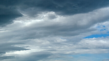 Cloudy background from dark clouds. Dramatic Clouds