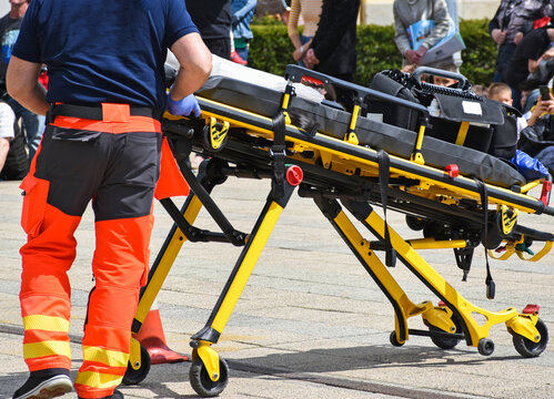 Paramedic with a stretcher on the street