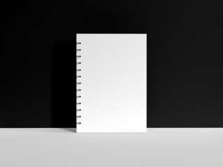 3D illustration. Notepad isolated on black background