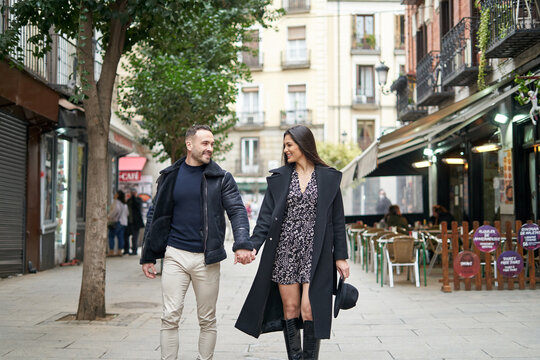 Couple walking together on street