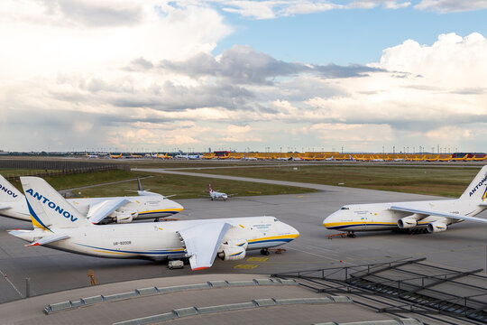 Schkeuditz, Germany - 29th May, 2022 - Many big An-124-100 ukrainian Ruslan cargo jets parked on Leipzig Halle airport terminal tarmac apron for loading, service and maintenance. DHL hub on background