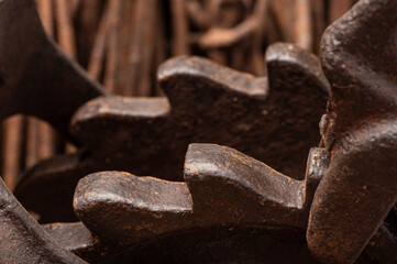 Rusty wire, john deere green patina with metal gears and close up macro of rusty steel bolts and paint