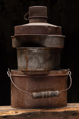 Antique vintage lunch box containers with thermos, wood and leather handles lots of rust and patina