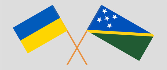 Crossed flags of Ukraine and Solomon Islands. Official colors. Correct proportion