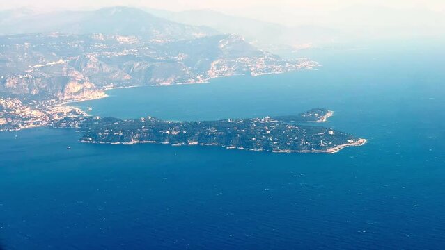 Cap d'Antibes from an airplane. Cote d'Azur from the air, aerial shoot oof the French Riviera