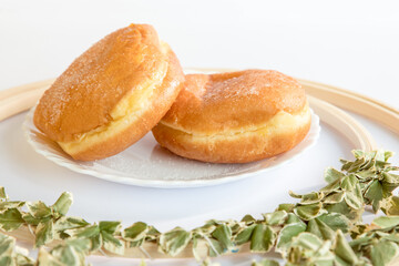 Bolas de Berlim, Berliner or donuts filled with egg jam, a very popular dessert in Portuguese pastry shops.