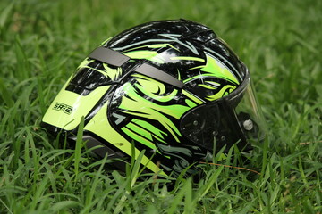 green helmet on grass