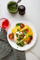 Heirloom tomatoes salad with burrata cheese top view