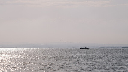 Obraz premium Fishing areas with nets inside the water in a lagoon.