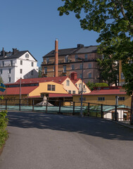 Old buildings at the canal Beckholmskanalen a sunny summer day in Stockholm