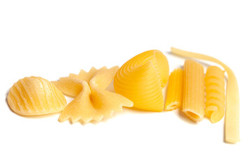 Variety of types and shapes of Italian pasta isolated on white background.