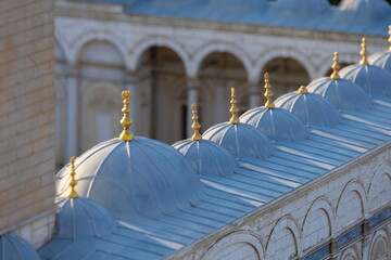 Mosque buildings and minarets, roof domes, arches and doors, elements of architectural decorations...