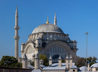 Mosque buildings and minarets, roof domes, arches and doors, elements of architectural decorations...