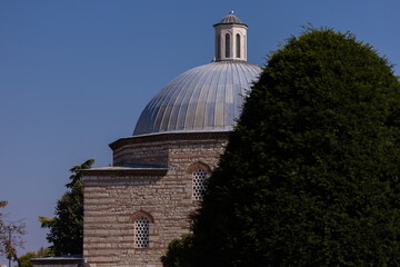 Mosque buildings and minarets, roof domes, arches and doors, elements of architectural decorations...