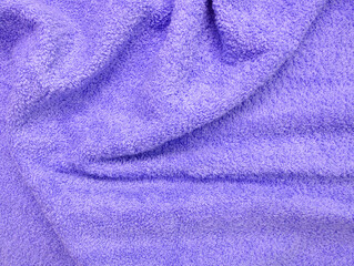 Fototapeta na wymiar Abstract purple textile towel texture. Background and texture.