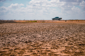 Fototapeta premium tractor in dry field