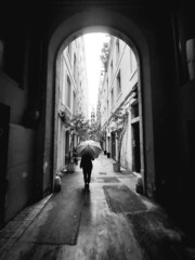 person walking in the rain