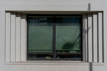 Gennevilliers, France - 04 06 2022: Eco-neighborhood. View of an office window in a modern building