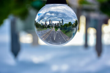 Downtown Atlanta seen through a lens ball on a cloudy day