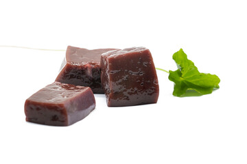 Fresh Pile of Beef liver cubes isolated on white background.