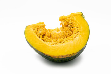 Pumpkin slices over on white background. Selective focus